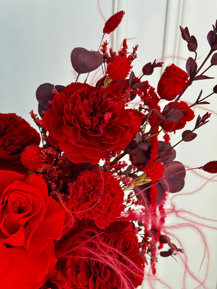 Red Velvet Los Angeles preserved red rose centerpiece with cascading accents