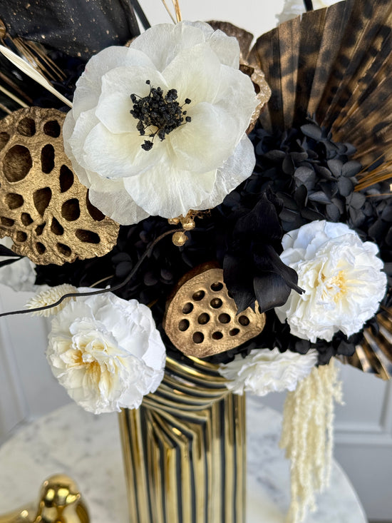 Tribal-inspired preserved flower design with natural elements for curated modern interiors