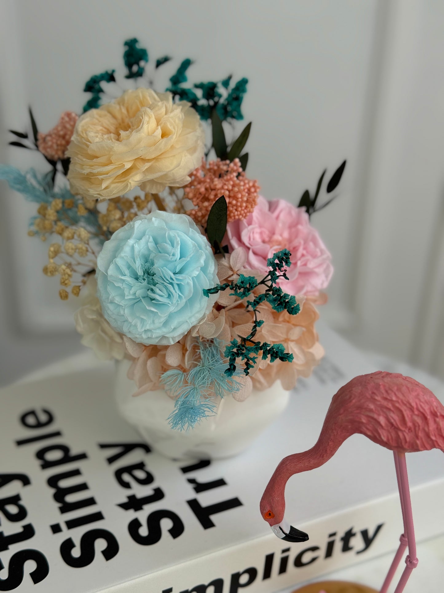 Petite preserved flower arrangement with hydrangea and greenery