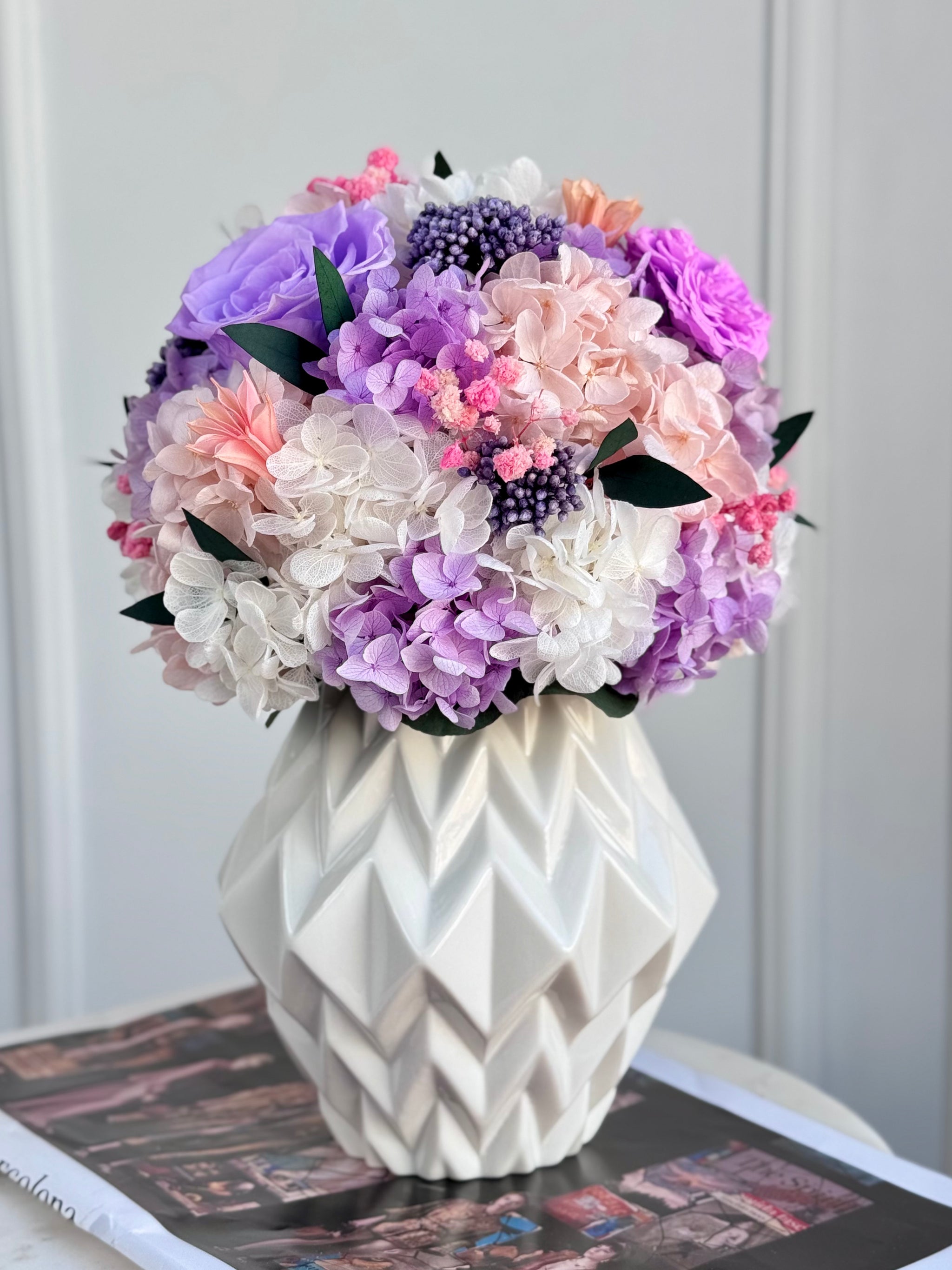 “Lilac Whisper bouquet styled in a minimalist glass vase on modern table”
