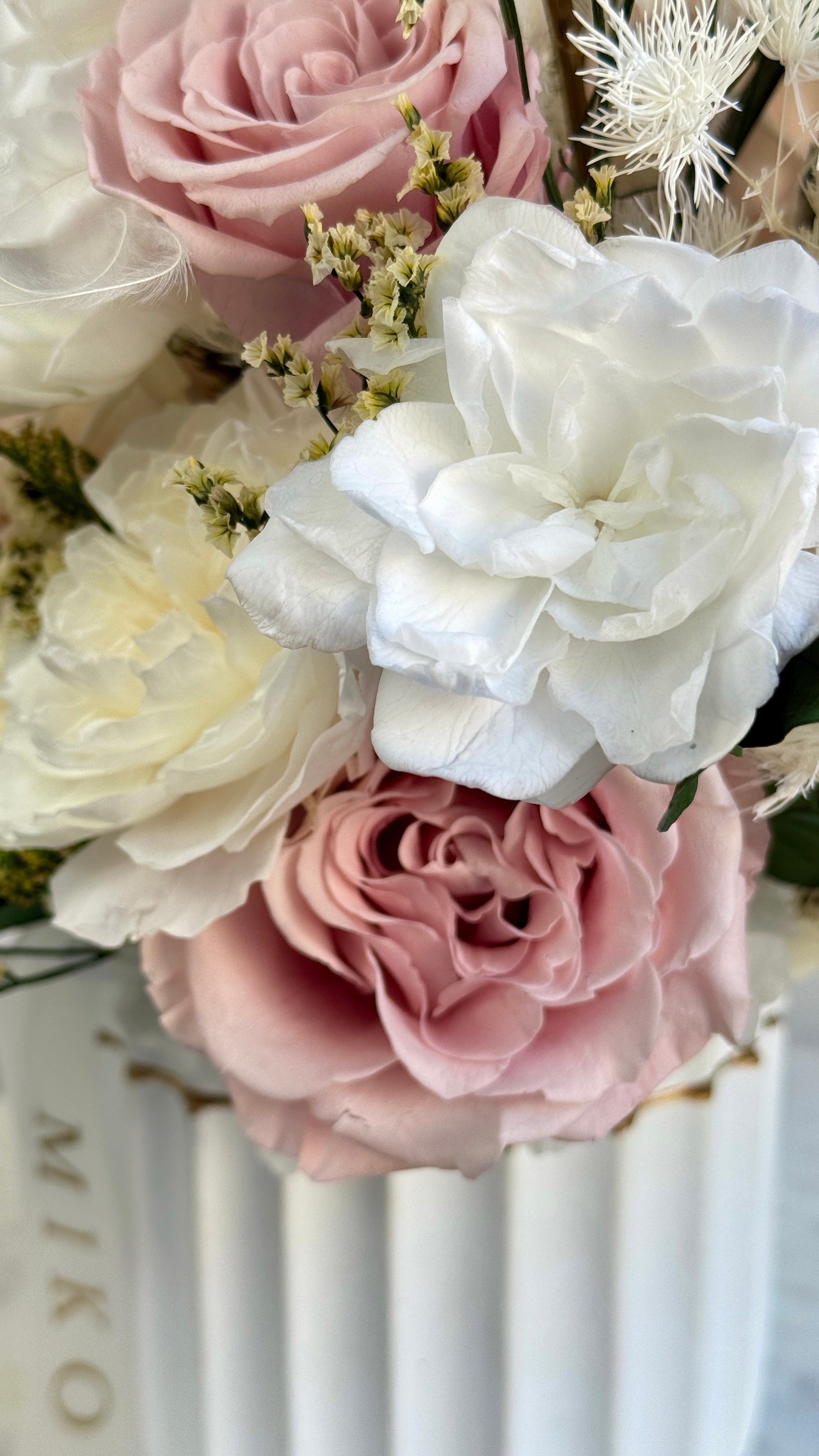 Soft ivory and cream preserved floral decoration