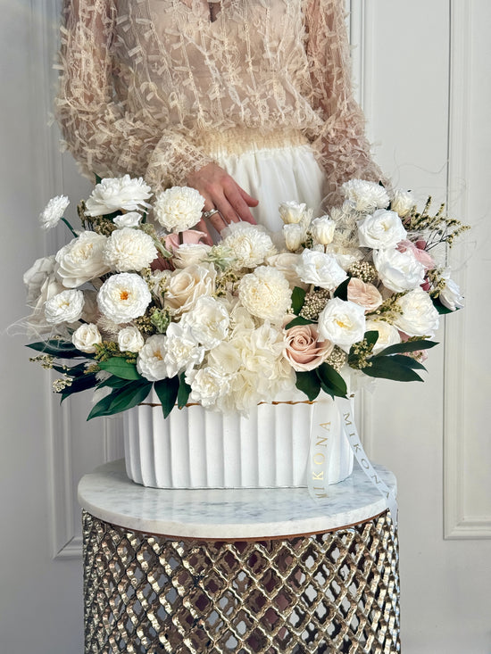 Elegant ivory preserved floral piece