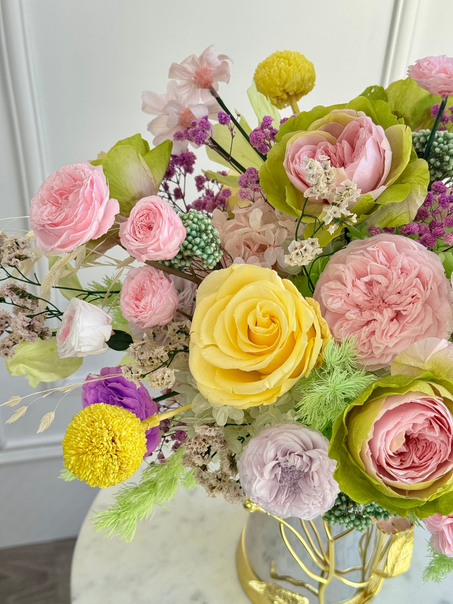 Close-up of bright preserved roses and blooms