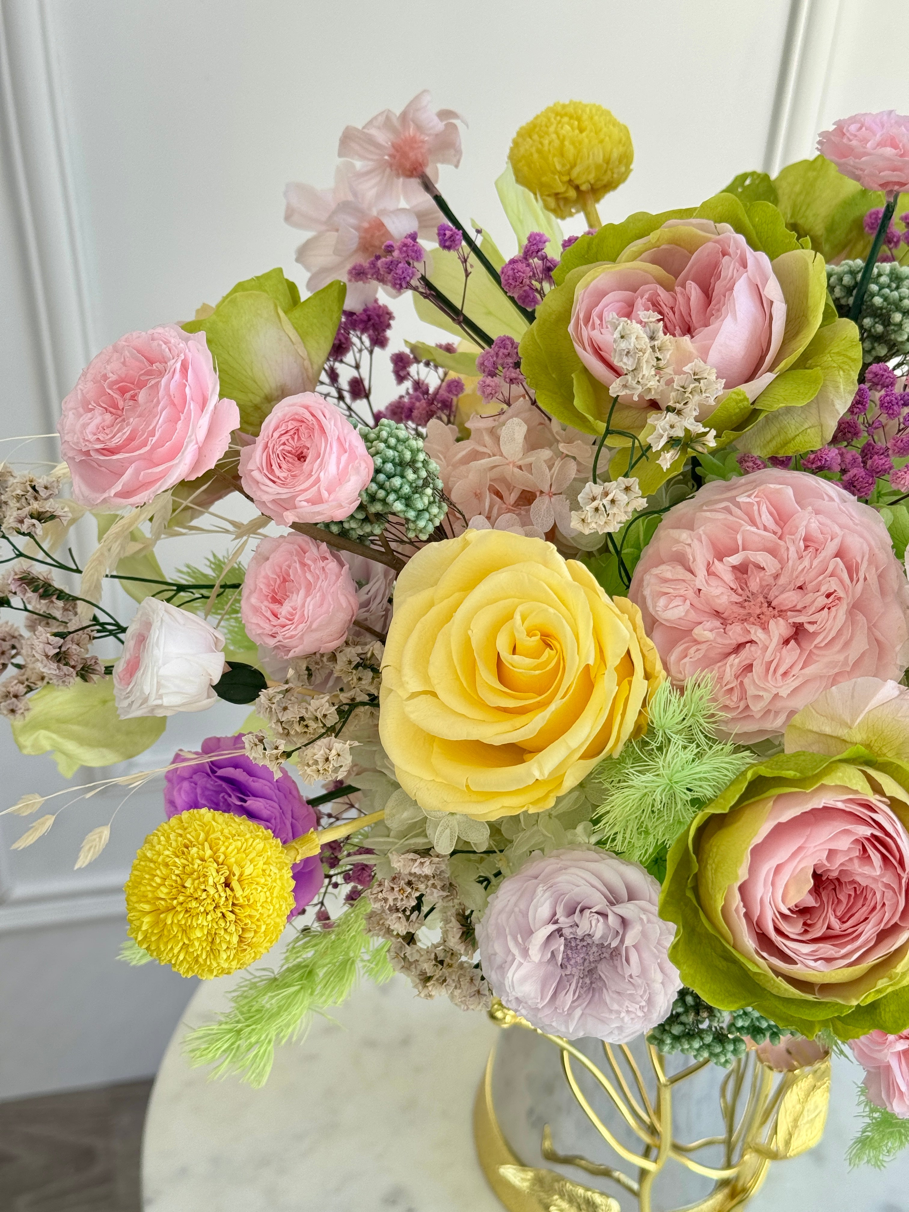 Close-up of bright preserved roses and blooms