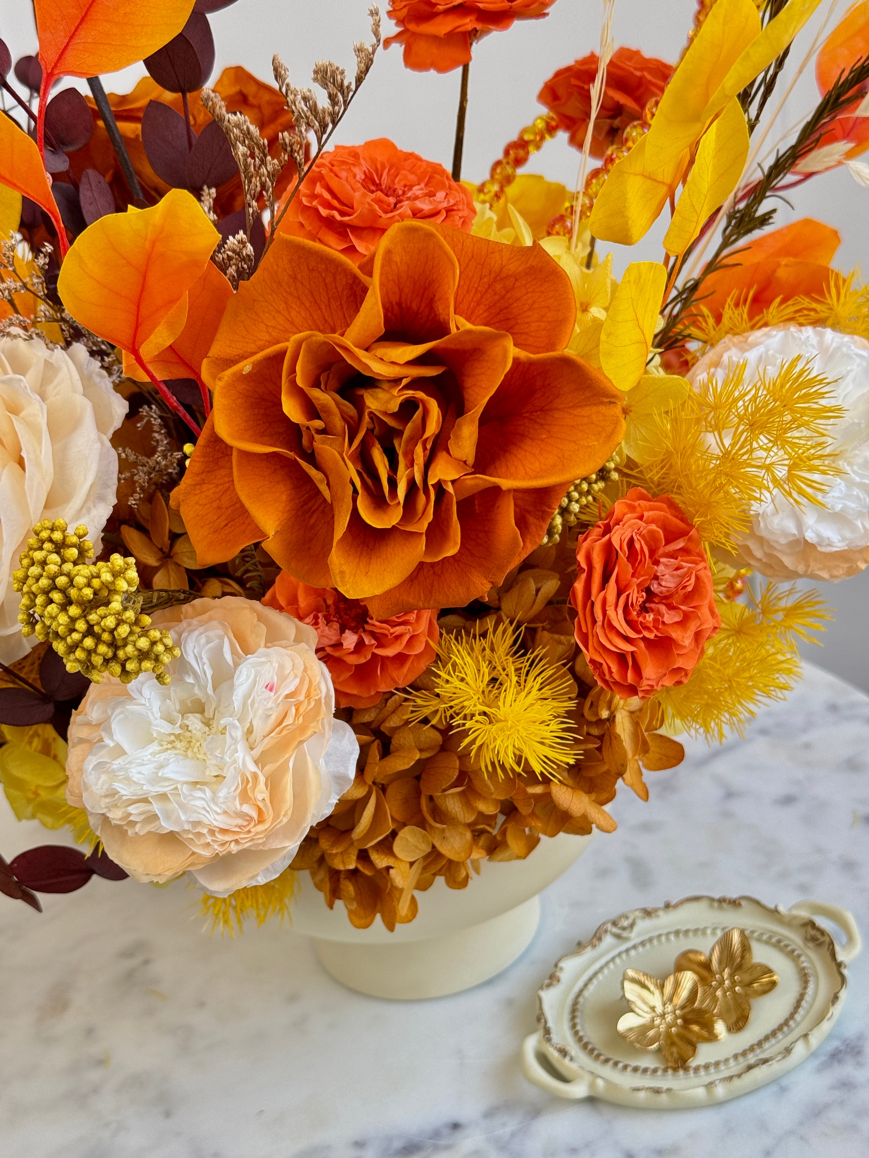 Golden preserved flower arrangement in Los Angeles